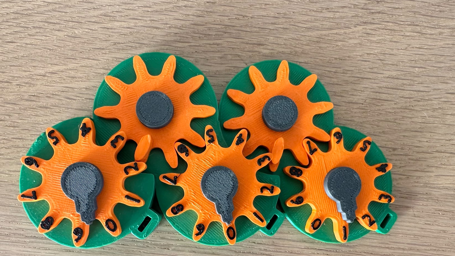 Black number on orange dial